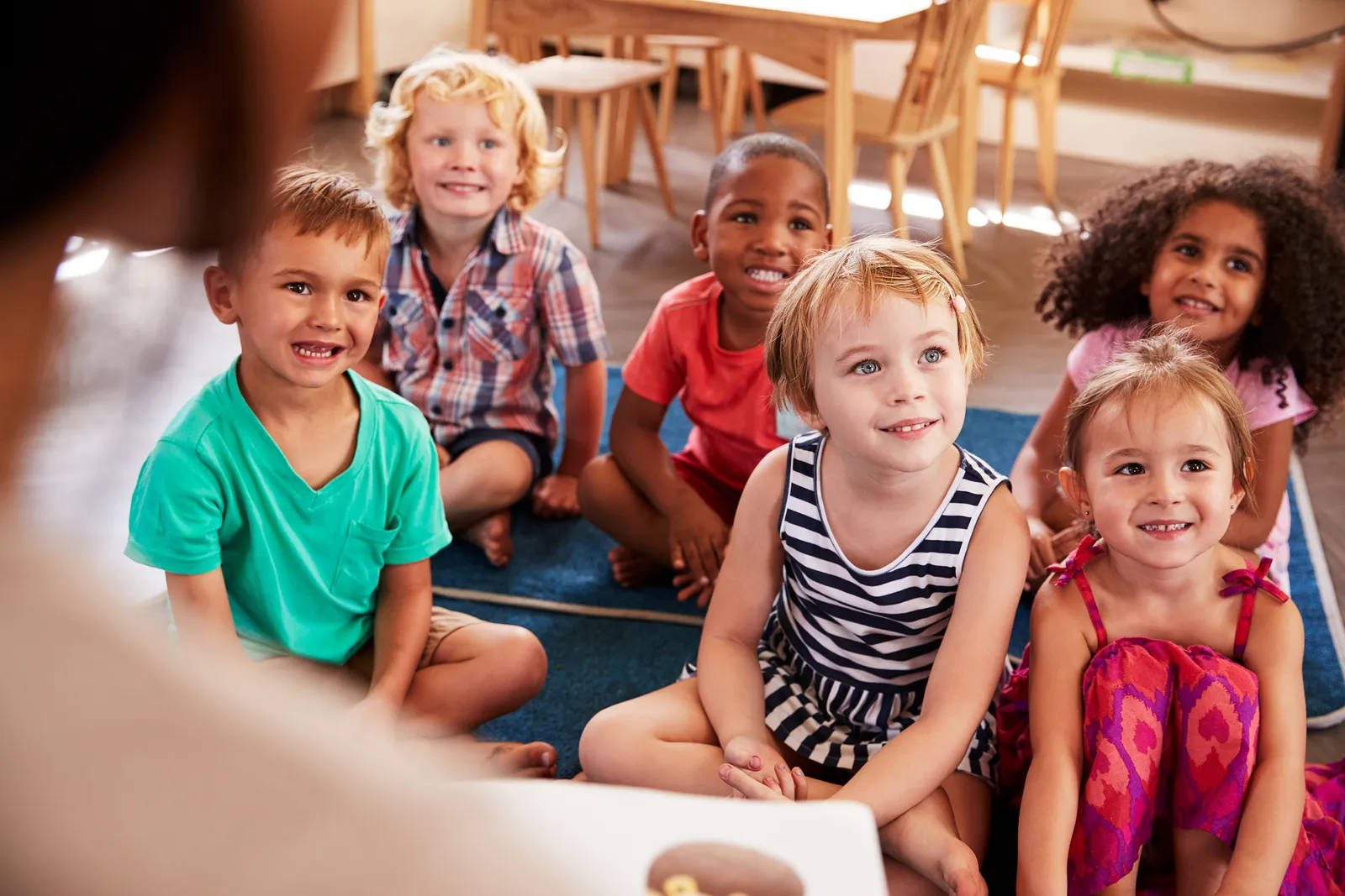 Instructor reading to children